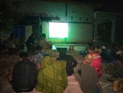 TMMD Ke-125 Satgas TNI dan Warga Desa Kramat Bersatu Dukung Timnas Indonesia U-23