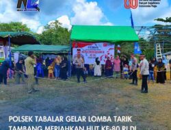 Polsek Tabalar Gelar Lomba Tarik Tambang Meriahkan HUT ke-80 RI di Kampung Harapan Maju